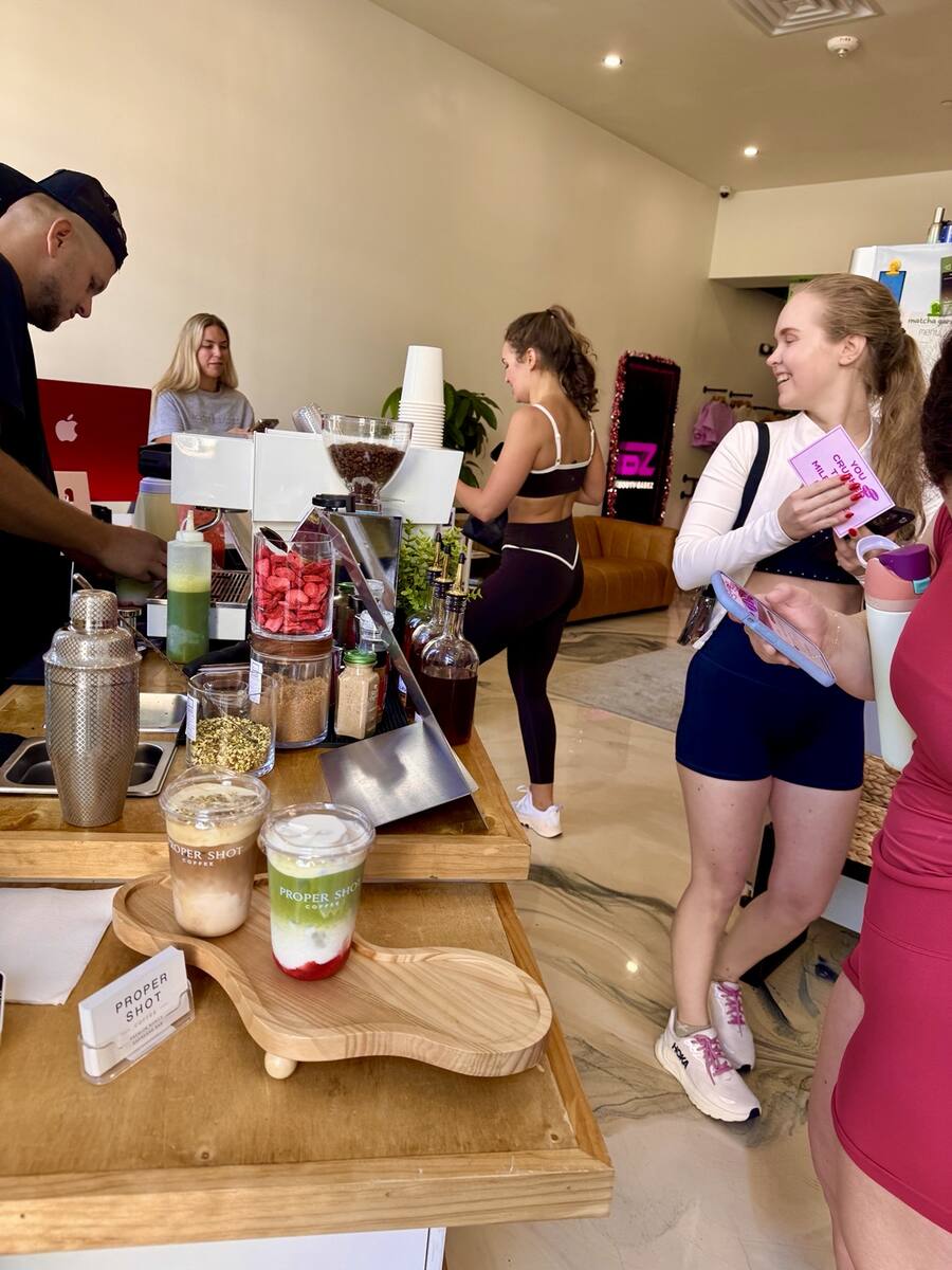 Guests enjoying Proper Shot Coffee at an event